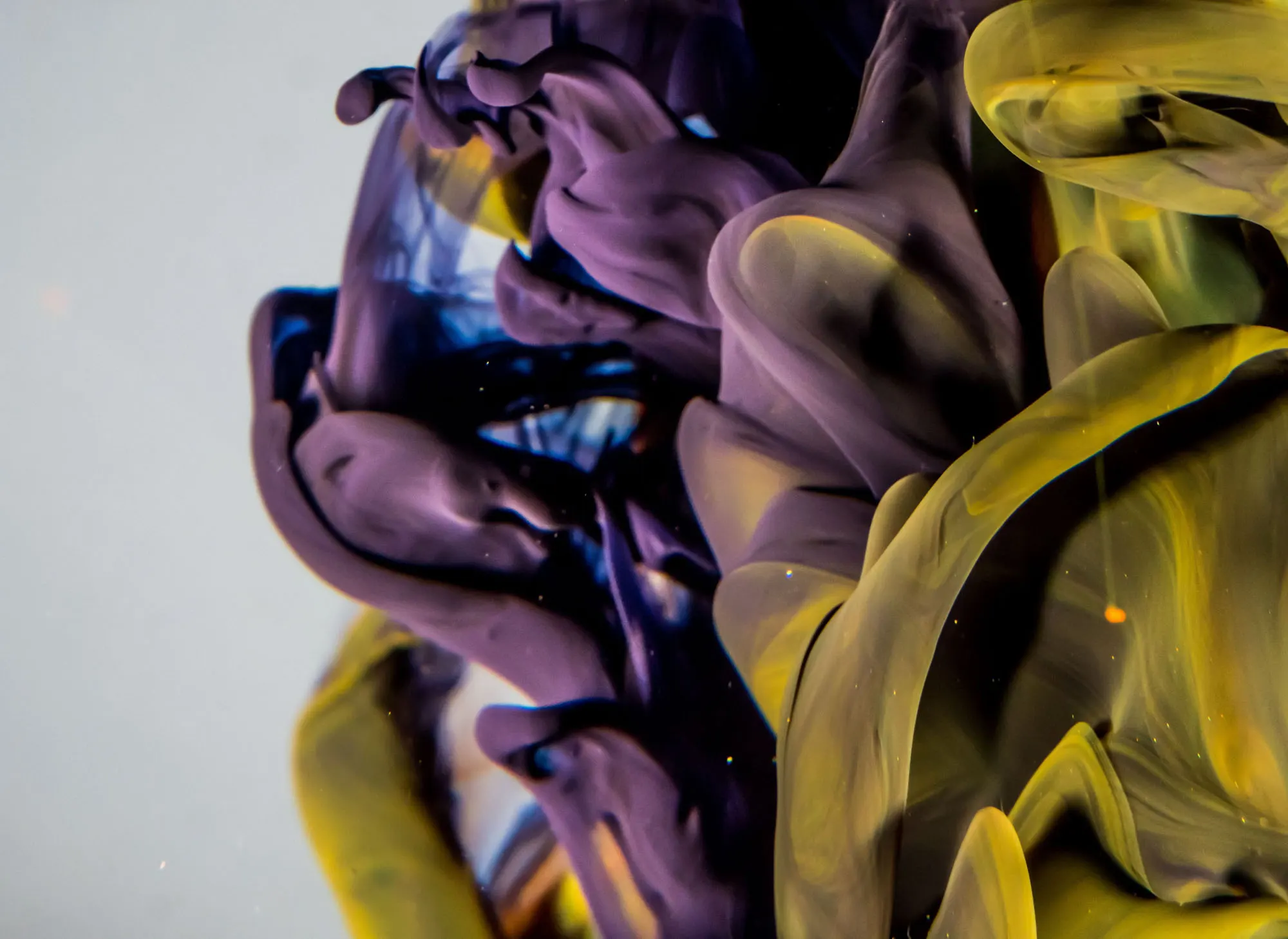 Abstract textured composition: yellow and violet marbled acrylic