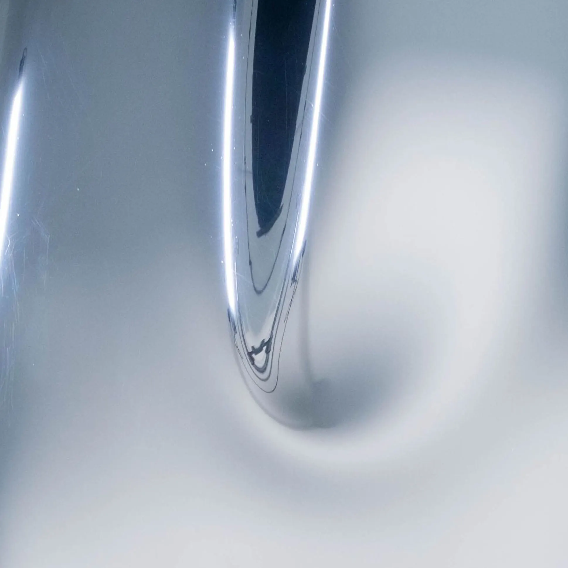 Curved mirror acrylic surface